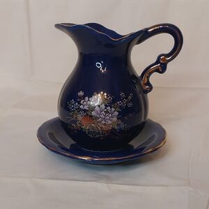 Elegant Blue and Gold Pitcher with Saucer